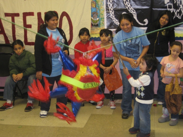 Children Smash the Neoliberal Piñata